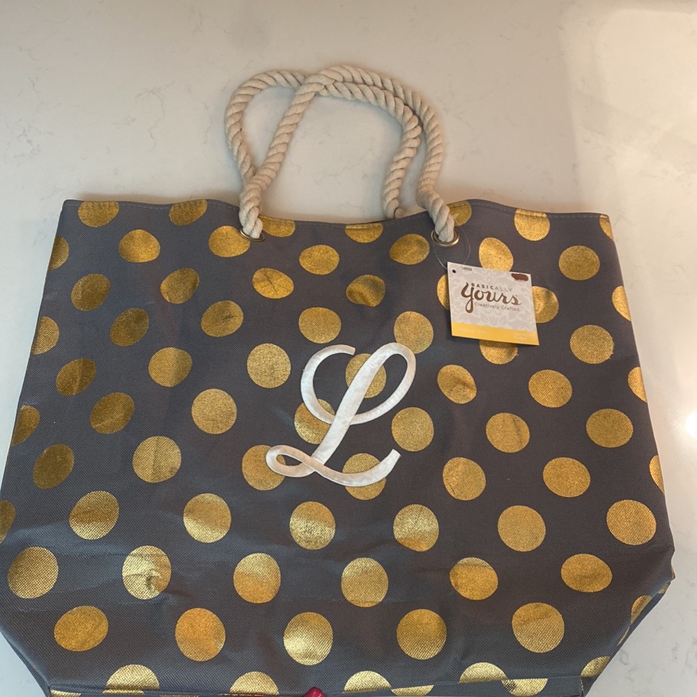 Gold Dot Tote with L monogram